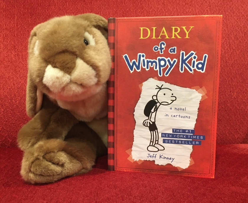 Caramel enjoyed reading Diary of a Wimpy Kid by Jeff Kinney, and is thinking he might come back to it right before starting middle school. 