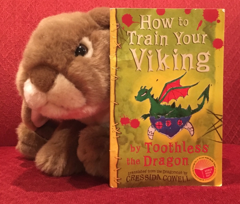 Caramel loved reading How to Train Your Viking by Toothless the Dragon, translated from the Dragonese by Cressida Cowell, and is looking forward to finishing up the original series soon. 