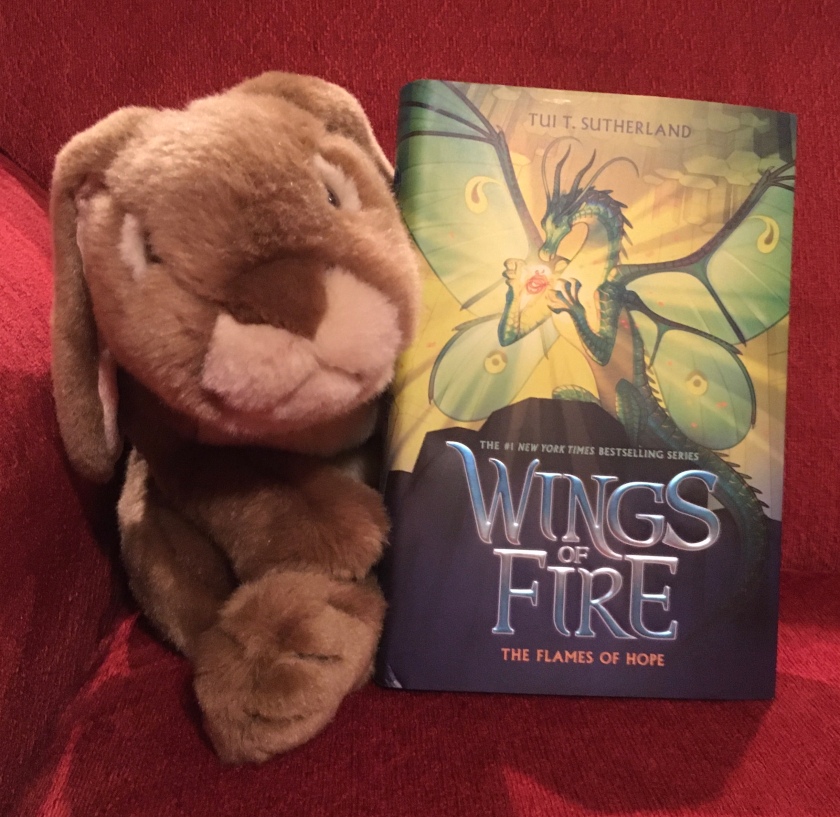 Caramel reviews The Flames of Hope (Book Fifteen of the Wings of Fire series) by Tui Sutherland.