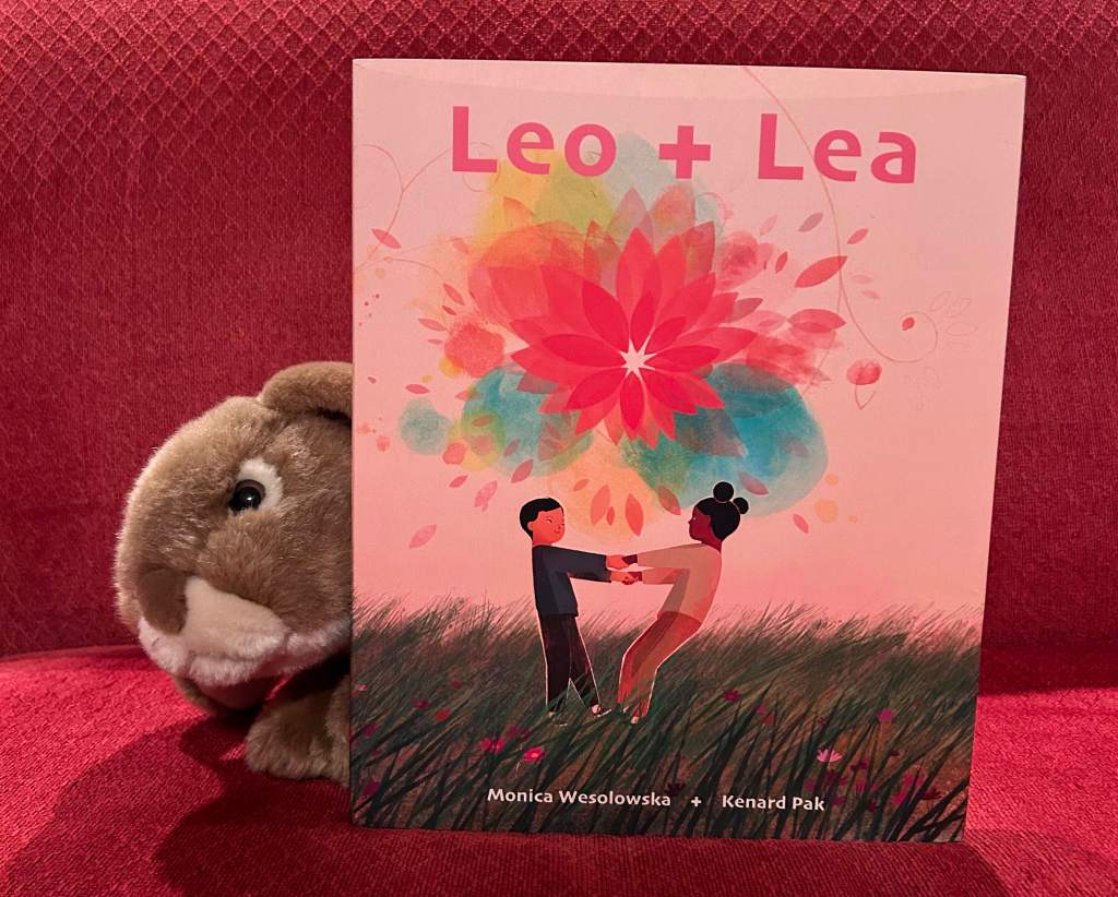 Caramel is reading Leo + Lea, written by Monica Wesolowska and illustrated by Kenard Pak.